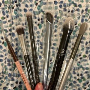 Sample makeup brushes, various sizes and brands.